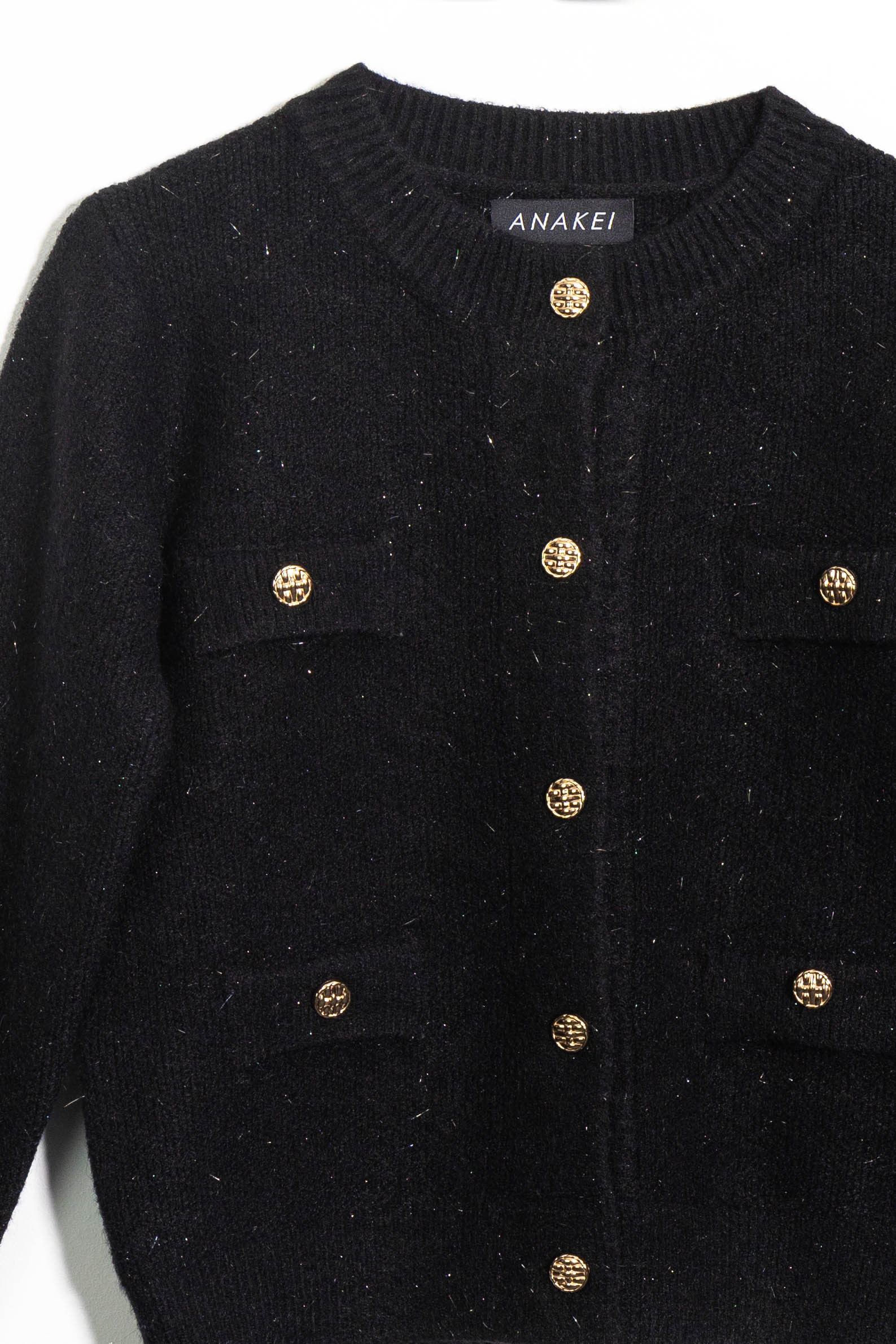 Sweater with buttons