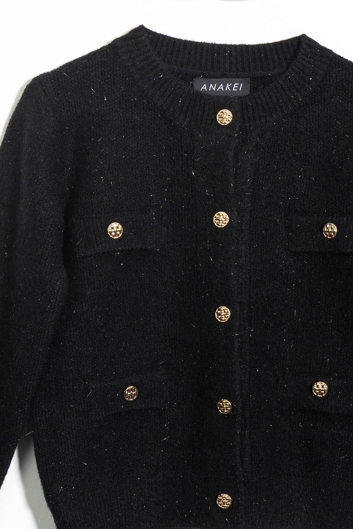 Maglione con bottoni